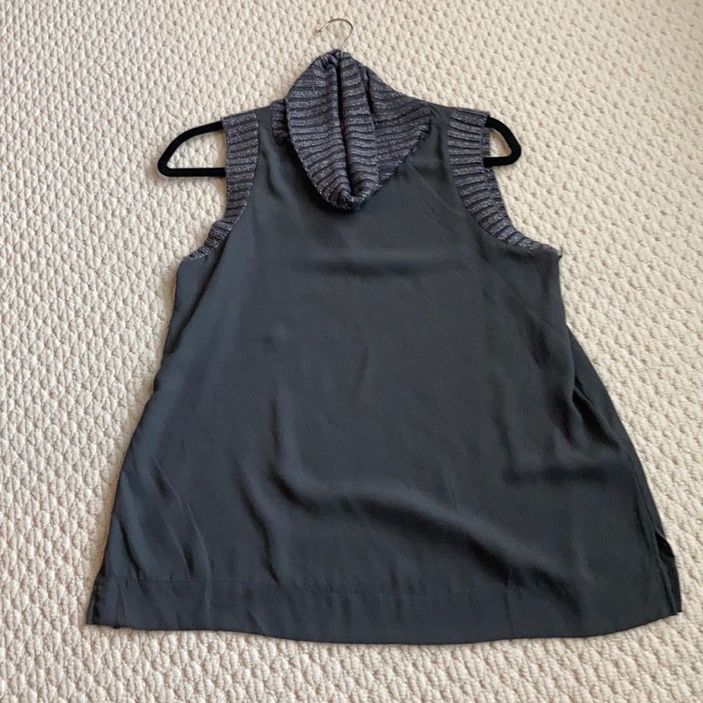 Grey, sleeveless turtle neck from Juicy Couture.